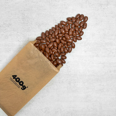 Migdolų riešutai pieniškame šokolade, 500 g