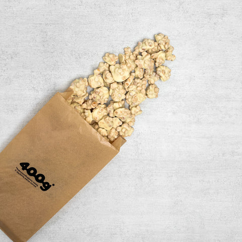 Sausainių ir karamelės gabalėliai baltajame šokolade, 500 g